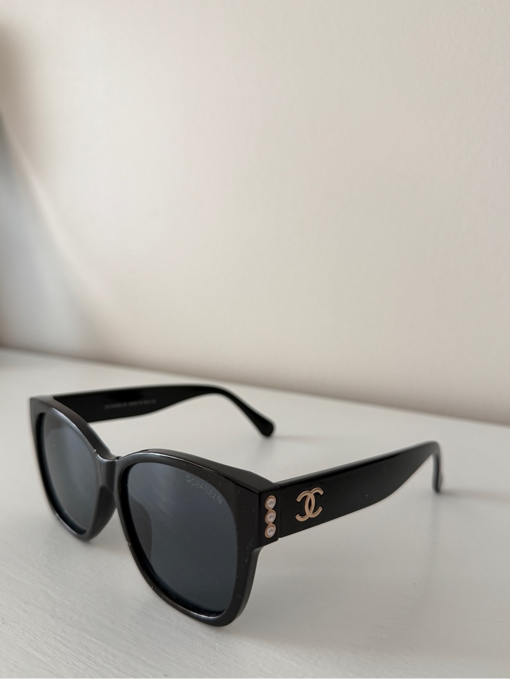 CHANEL Black Sunglasses with Gold CC and Pearl Accents